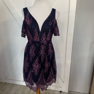 Navy blue lace dress with purple floral accents